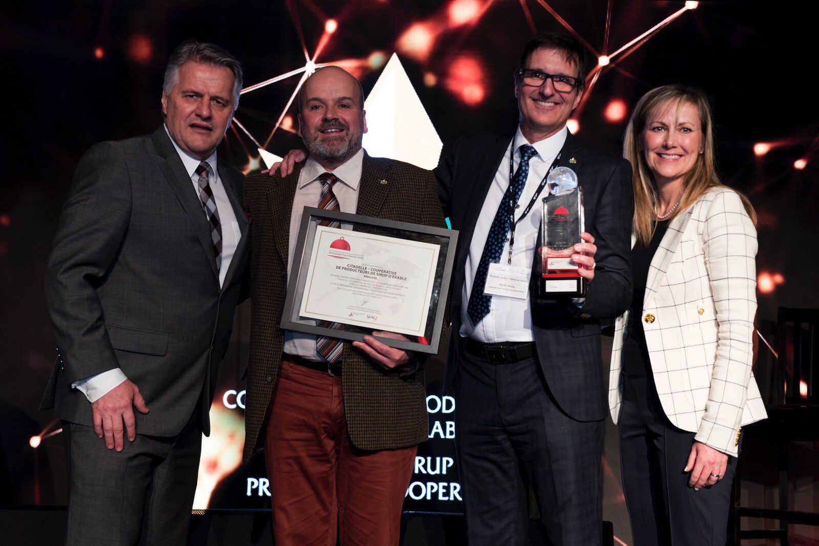 Laurent Lessard, ministre (MAPAQ), St&eacute;phane Vachon et Martin Plante de Citadelle, et Sophie Perreault de FAC. 